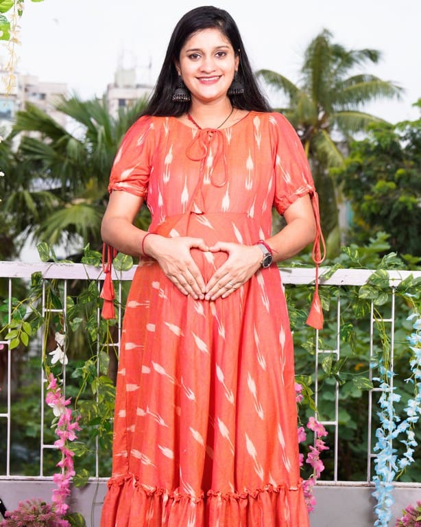 Tangy orange frill ikat maternity dress
