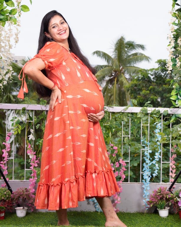 Tangy orange frill ikat maternity dress