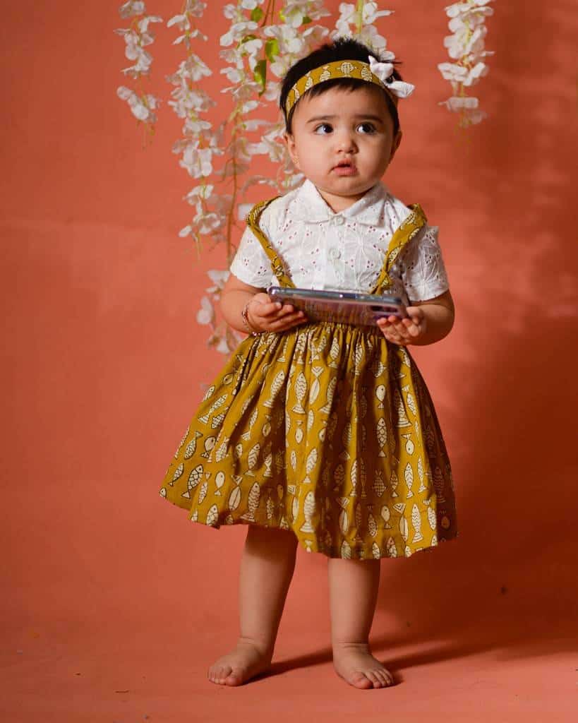 Yellow Fish Print Skirt with White Shirt Secondary image